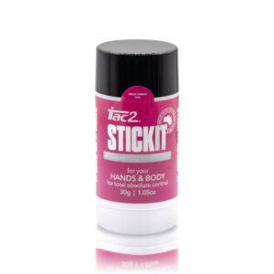 Pink bottle with a black cap and a bright pink label; text indicates a hand and body care product with a tamper seal sticker visible on the label